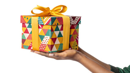 Hand holding gift box with yellow ribbons isolated on white background