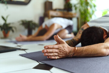 Hands, people or stretching in floor yoga for back release, relax or morning zen routine in home...