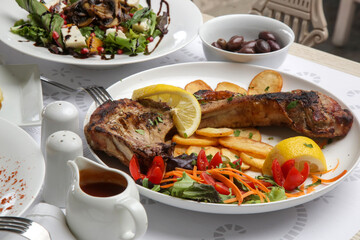 Various Mediterranean dishes served on the restaurant table	