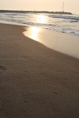 Sunset on the beach by the sea in the evening, coastal landscape, calm lifestyle, walking outdoors, shore nature scenery, soft sun light, adventurous vacation holiday idea, wallpaper, outside trees