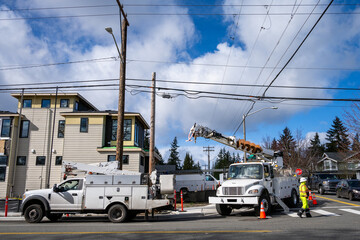 Utility digger derrick truck with pole setting equipment, ready to remove temporary wood powerline...