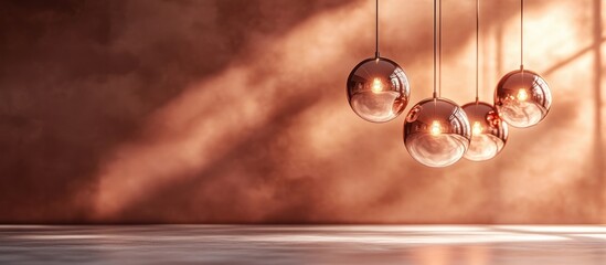 Obraz premium Warm toned copper spherical pendant lights casting a soft ambient glow in a minimalist contemporary interior design setting The glowing orbs create a cozy