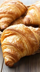 Golden Brown Croissants in Basket Delicious French Pastry Bakery