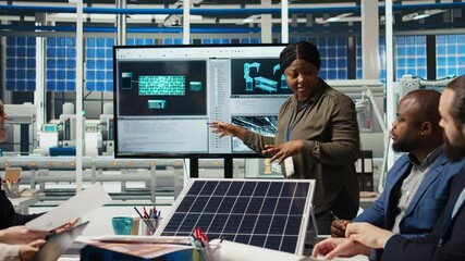 Factory research and development division scientists collaborate to test nanomaterials for next generation solar panels, aiming for breakthroughs in durability and performance, camera A