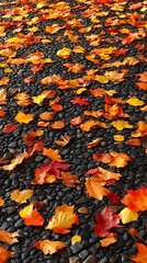 Obraz premium Colorful Autumn Leaves Covering Stone Pathway Create a Vibrant Fall Scene