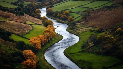 Scenic river winding through autumnal countryside