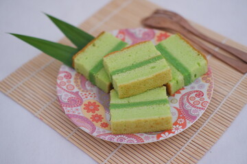 several slices of green pandan sponge cake