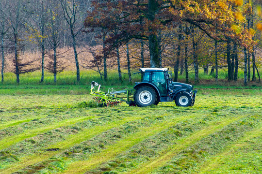 Tractor with Tedder in the Field