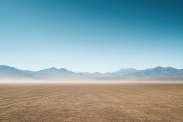 Desert expanse, hazy mountains, dust, empty space, vast landscape