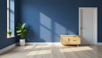 A blue wall with a wooden cabinet, a plant on the left and a wooden floor in a room with natural light 