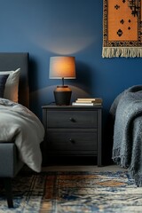 A cozy bedroom with a cotton branch in a decorative vase, warm textiles, and a mix of organic and modern design elements.
