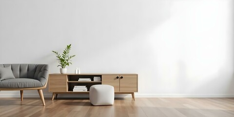 A white TV stand with a plant on top and a white ottoman in front of a white wall with wooden floor 