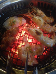 Shrimps Seafood bbq on stove, fire
