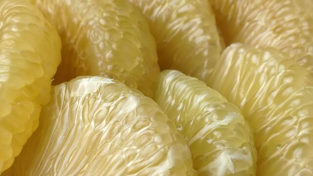 Close-up of yellow pomelo pulp texture