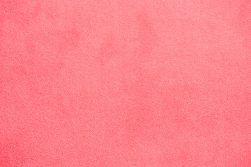 Pink fabric, velvet surface. Abstract bright pink background, fabric texture.