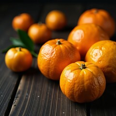 Close-up of juicy tangerines on dark wooden table, citrus, ripe, fruit