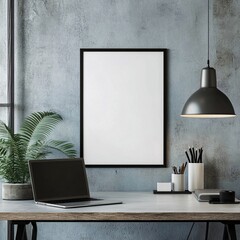 Minimalist Workspace Setup Featuring Laptop Framed Artwork and Industrial Style Lighting Design