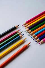 Fototapeta premium a close up of a group of colored pencils on a table