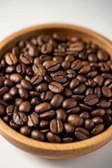 Fototapeta premium a close up of a bowl of coffee beans on a table