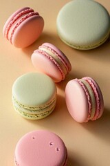Obraz premium several macarons are arranged on a table with a yellow background