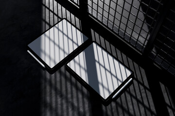 Tablet with a blank screen lies on a dark surface mockup.. great for showcasing digital design mockups in a sleek and professional way for technology presentations.