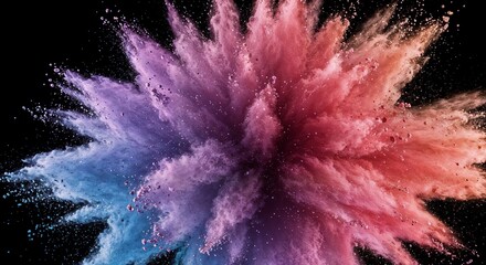 Color powder explosion in vibrant hues against a black background for creative effects