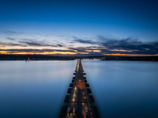 Bellevue WA USA - February 28th 2025: Peaceful dusk car lights at 520 Bridge