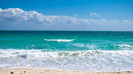 Crystal-clear sea beach water. Luxury sea beach resort. Beautiful sea beach sunset. Calm sea beach seascape. Idyllic summer paradise.