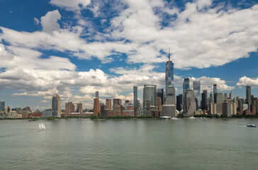 Fototapeta premium Manhattan aerial skyline, New York, United States. Panorama view of New York city skyscrapers in Manhattan. USA NYC. Lower NYC skyline. New York cityscape. New York City from drone.