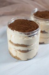 Tiramisu chocolate cake dessert in a jar