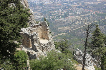 The Saint Hilarion Castle lies on the Kyrenia mountain range, in Cyprus. This location provided the castle with command of the pass road from Kyrenia to Nicosia. 