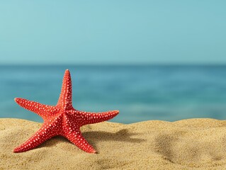 Vibrant Red Starfish on Sandy Beach with Calm Blue Ocean Background