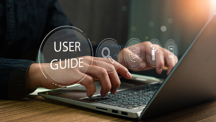User manual guide concept, Online instruction manual and strategy advice. Businessman using laptop with user manual icon and virtual AI for business service