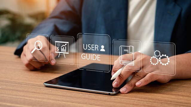 User manual guide concept, Online instruction manual and strategy advice. Businessman using laptop with user manual icon and virtual AI for business service