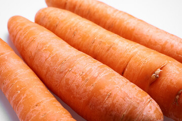 fresh carrots on a white background