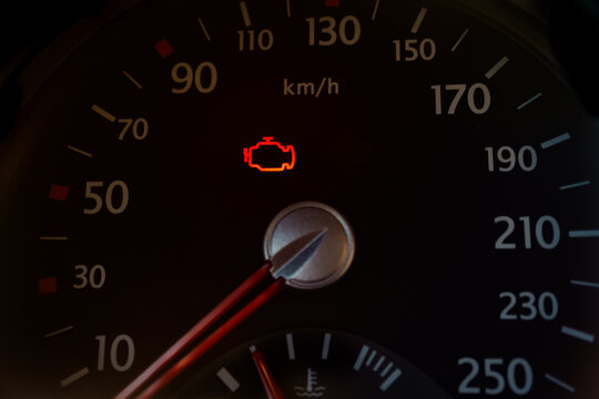 car dashboard lights with warning lamps illuminated. Light symbol that pops up on dashboard when something goes wrong with the engine