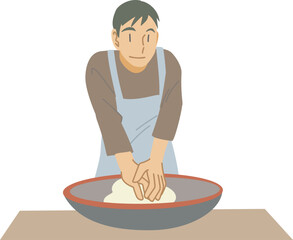 こね鉢でそば粉をこねる男性