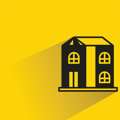 house building icon with shadow on yellow background