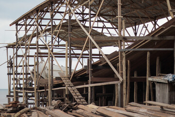Phinisi shipbuilding place in Bira, Bulukumba, South Sulawesi. Traditional Phinisi yachts are crafted with craftsmanship and every beam and wood is carefully selected to ensure quality and durability.
