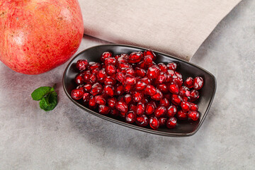 Ripe sweet red pomegranate seeds