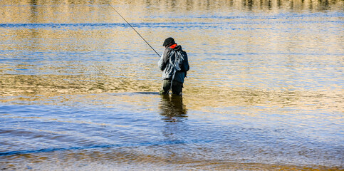 Fisherman at Vieux-Boucau Lake in southwest France