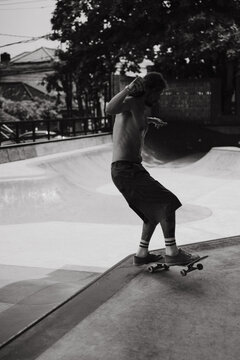Young men skateboarding in skate park, Canggu, Bali, Indonesia