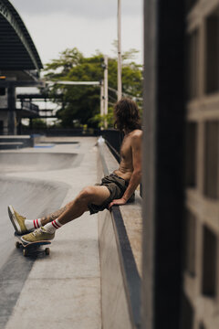 Young men skateboarding in skate park, Canggu, Bali, Indonesia