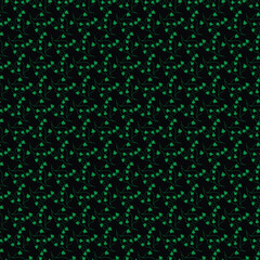 Seamless Pattern of Green Floral Motif on Dark Background