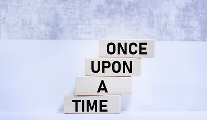 Once upon a time, text on wooden blocks and a beautiful background