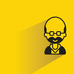 bald man icon with shadow on yellow background