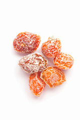 On a white background of dried fruit
