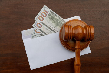 Bribery or Fine? Legal System Depiction with Gavel and Cash