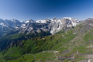 View from Schilthorn to Eiger, Monch and Jungfrau Alpine peaks in the Bernese Alps. Switzerland....