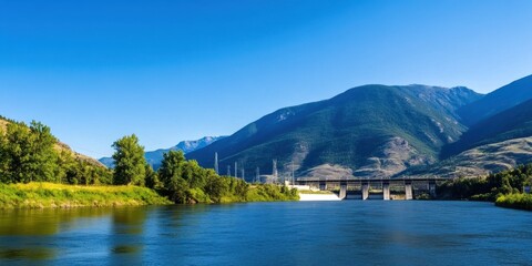 Scenic Mountain Range Featuring a Stunning Hydroelectric Dam Amidst Nature's Beauty